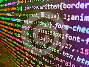 Coding background. Programming on monitor background. HTML5. HTML and CSS code developing screenshot. Front-end applications in photo