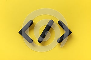 Coding language development icon on yellow background. Software development concept. Programming code browser symbol, 3d sign