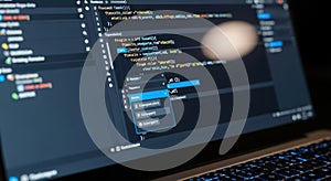 Coding on Laptop Screen