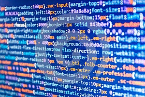 IT coding on monitor screen. JavaScript code in text editor. Website design.