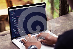 Coding and programming for web development and web design concept using laptop / computer