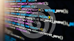 Coding screen with multiple lines of code in different colors on a black background