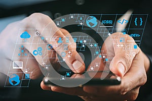 close up of businessman hand working with smart phone in modern