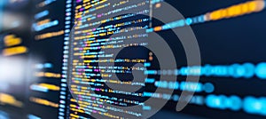 Coding and software development Lines of colorful programming code displayed on a computer monitor