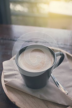 Cofee cup on table vintage color