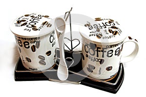 Cofee cups and coffee-spoon