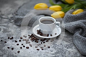 Cofee and yellow tulips