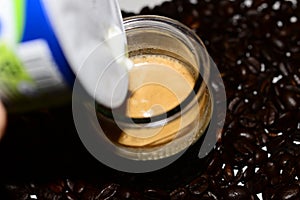 Coffe beans and copy space in cup
