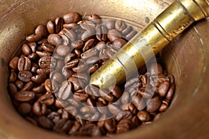 Coffe beans and mill macro shot