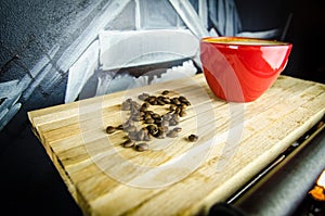 Coffe Cup with Beans on Plate