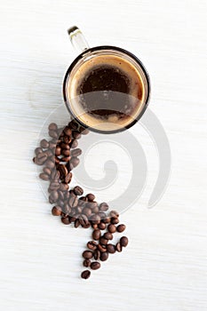 Coffe in cup and coffee beans