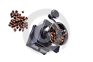 coffe grains with grinder. Manual coffee grinder