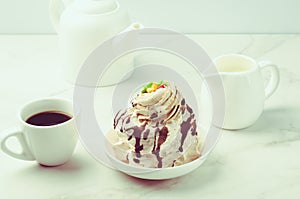 Coffe, milk, teapot and dessert/Coffe, milk, teapot and dessert on a white background. Selective focus