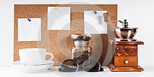 Coffe Time MockUp. Manual coffee grinder, a jar of coffee beans, a white cup, a desktop with pinned white stickers on it