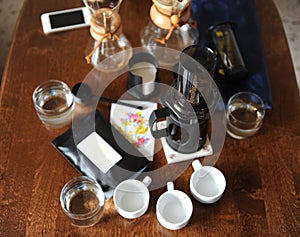Coffee accessories on a dark wooden table