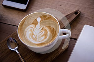 coffee aroma latte art cup on wood table relaxtime in cafe coffee shop