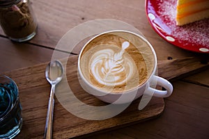 coffee aroma latte art cup on wood table relaxtime in cafe coffee shop