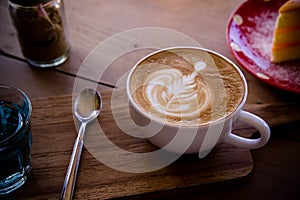 coffee aroma latte art cup on wood table relaxtime in cafe coffee shop