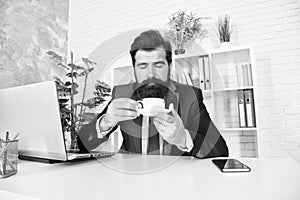 Coffee aroma restores brain activity. Bearded man smell aroma of hot cup. Enjoying coffee aroma. Aromatic drink