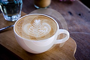 Coffee aroma white cup on wood table in the morning time