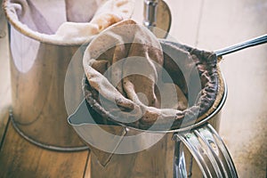 Coffee bag in stanless steel pot photo