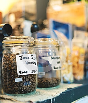 Coffee Bean in Glass Jar. Arabica Coffee Bean Variant Java Ijen Raung with Roast Honey Process To Enhance Sweet and Bitter Flavor