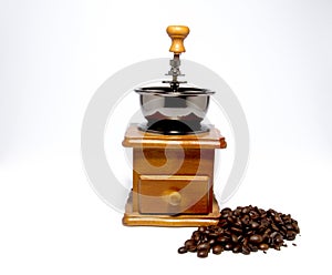 Coffee bean grinder, a hand-cranked wooden box placed