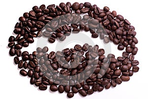 Coffee bean shape created with coffee beans