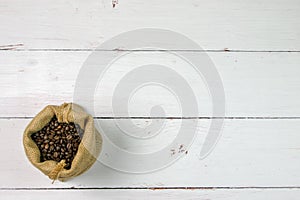 Coffee Bean. White wooden background