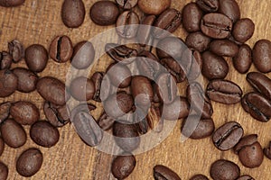 Coffee Beans on Zebrano wood cutting board photo