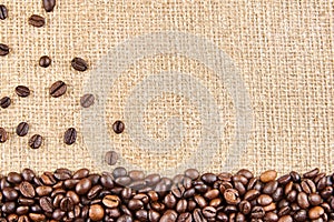 Coffee beans on a background of burlap