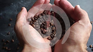 Coffee beans background. Making and roasting coffee beans for a drink.  Food and drinks video, top view