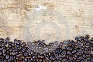 Coffee beans background on wooden, Fresh coffee beans.