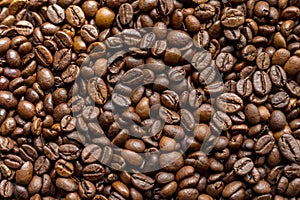 coffee beans beckground texture lose up.