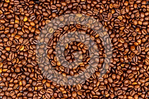 Coffee beans bright saturated texture. Roasted coffee beans background