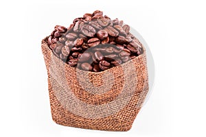 Coffee beans in a burlap bag isolated on white background