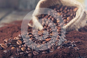 Coffee beans in burlap sack photo