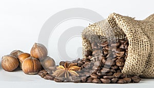 Coffee beans in a canvas bag isolated white background