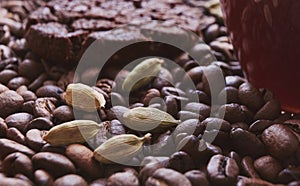 Coffee beans, cardamon and cake