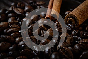 Coffee beans and cinnamon sticks closeup, macro Wallpaper