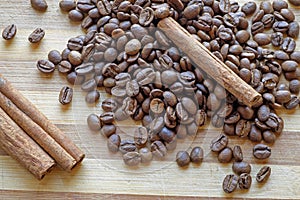 Coffee beans and cinnamon sticks diagonal landscape top