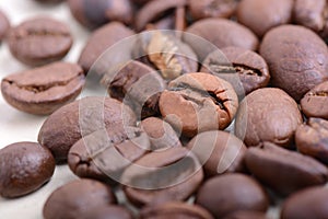 Coffee beans  close up. Coffee beans background. Roasted aromatic brown coffee beans close up