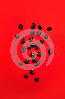 coffee beans close-up on a red background