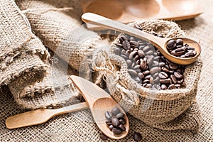 Coffee beans in coffee bag made from burlap