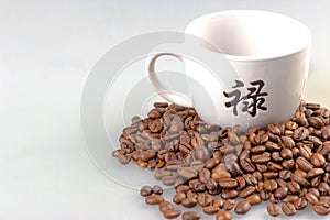 Coffee beans with coffee cup