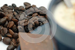 Coffee beans and coffee cup