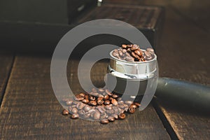 Coffee beans in the coffee tablet. Stil life style and Vintage.