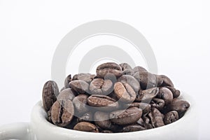 Coffee beans in the cup