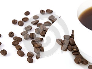 Coffee beans and cup