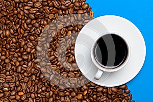 Coffee beans and cup